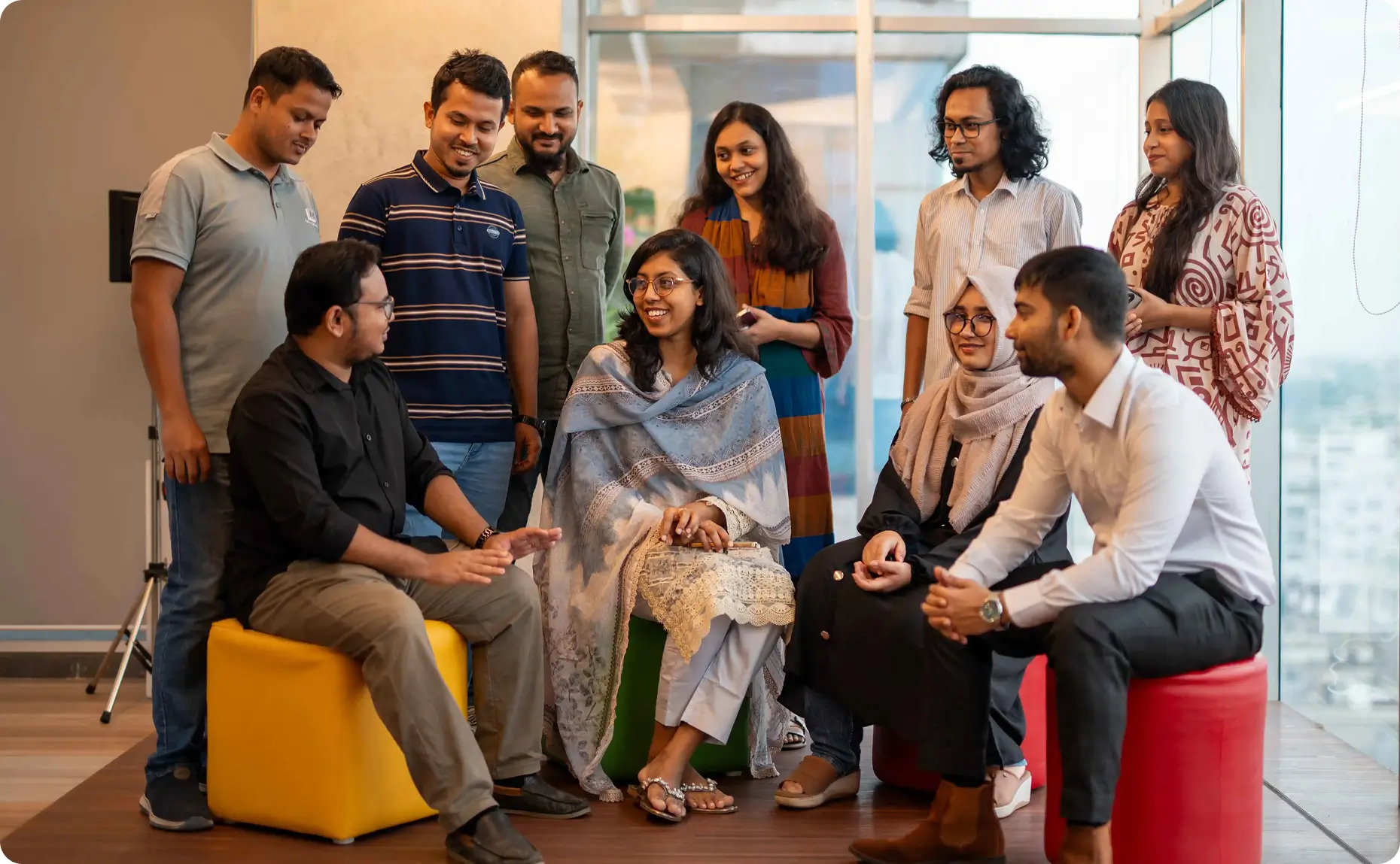 The wider team together at the office