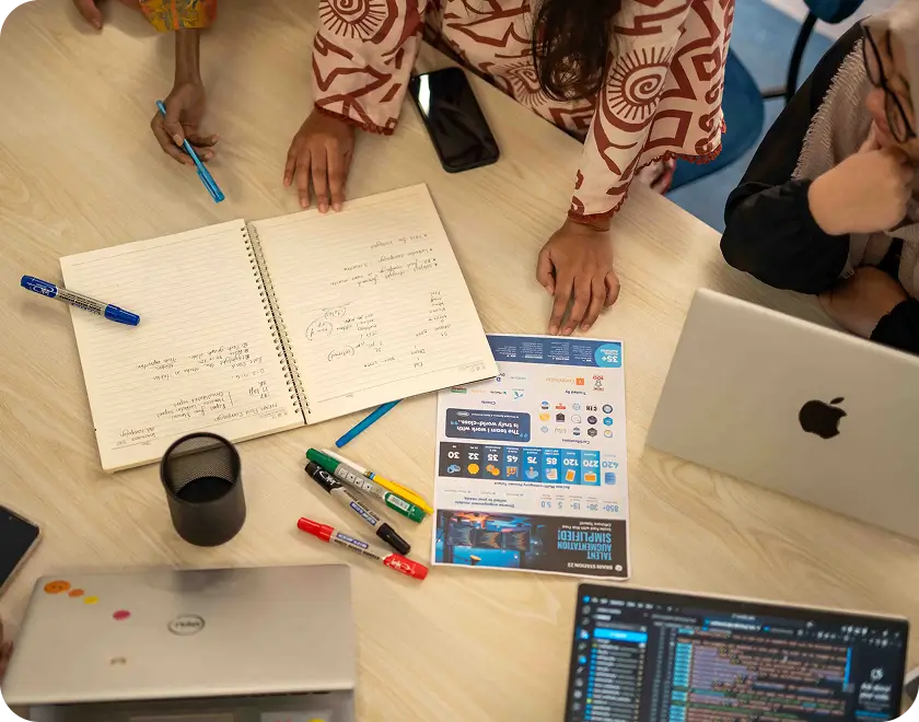 Design notes, sketches and laptops on a studio desk
