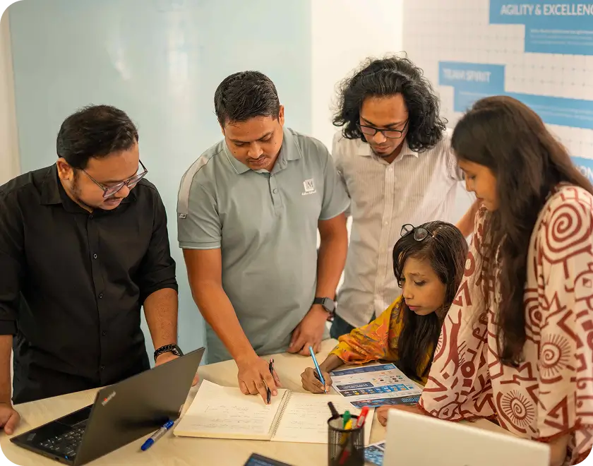 Design team reviewing wireframes together